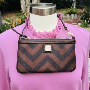 DOONEY AND BOURKE WRISTLET SMALL POUCH GOLD TONE HARDWARE